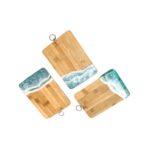 Ensemble de planches à découper en bambou avec design vague océanique, finition mate, écologique, style nordique, pour la cuisine - Product Image 1