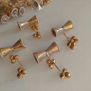 Ensemble de latkans dorés élégants et faits à la main, conçus avec des fils métalliques fins, des bordures perlées et des clochettes ghungroo mélodiques. - Product Image 1