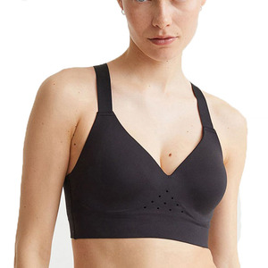 Sujetador deportivo de yoga sin costuras con cuello en V y espalda cruzada para mujer, color negro, soporte medio, transpirable, color liso - Product Image 1
