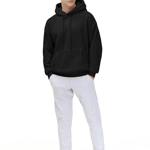 Ensemble jogging homme noir en molleton épais, sweat à capuche oversize et pantalon de survêtement à revers, ensemble décontracté d'hiver à séchage rapide - Product Image 1