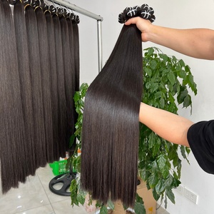 Vente en gros de qualité supérieure 100% extensions de cheveux Remy humains naturels os noir cheveux crus vietnamiens droits prix d'usine - Product Image 1