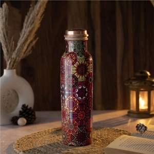 Bouteille d'eau artisanale en cuivre pur 1000 ml – Bienfaits ayurvédiques pour la santé |   Gourde en cuivre anti-fuite imprimée mandala pour le yoga, le sport et la gym - Product Image 1