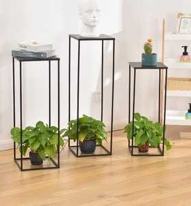 Modernos Soportes de Acero Inoxidable para Plantas de Interior con Base Blanca y Marco Negro, Lavables, Novedad para Navidad - Product Image 1
