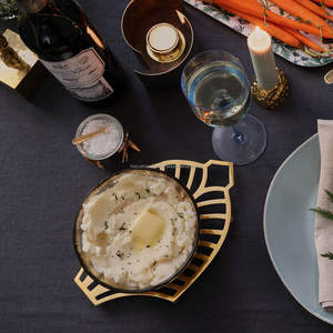 Modern Artistic Metal Sculpted <b>Trivet</b> With Cutout Design Perfect For Stylish Homes And Everyday Cooking Convenience - Product Image 3