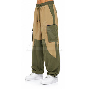 Pantalones de Paracaídas para Hombre con Corte Holgado, Puños Ajustables, Tela Ligera y Bolsillos Laterales para Moda Urbana - Product Image 5