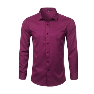 เสื้อเชิ้ตทำงานสีพื้นแบบยูนิเซ็กซ์ ผ้าซาตินคอตตอน 100% ระบายอากาศได้ดี ปกคอพับ แขนยาว สำหรับฤดูใบไม้ผลิ - Product Image 1