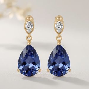Boucles d'oreilles clous en tanzanite en forme de poire en or massif 10 carats ou platine avec accent de diamant, bijoux fins, fabricant OEM - Product Image 1