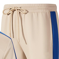 Veste de survêtement unisexe beige sportive avec rayures bleues, col montant, fermeture éclair, poids moyen, respirante, pour l'automne