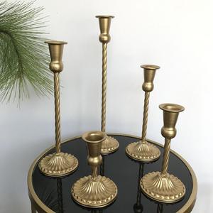 Vintage iron <b>candle</b> <b>holder</b> with rustic hand-made details & exquisitely curved designs for farmhouse-style interiors - Product Image 1