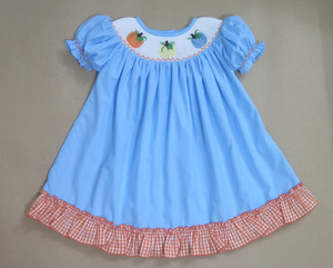 Vestido de Bebé Niña Azul Claro con Bordado de Calabaza - Product Image 1