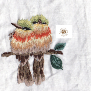 Cute birds duo, playful style perfect for light, joyful tables. - Product Image 1