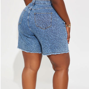 Shorts de mezclilla ajustados rasgados para mujer, de cintura media, estilo casual de verano, elásticos, 100% algodón, con bolsillos y efecto desgastado. - Product Image 1