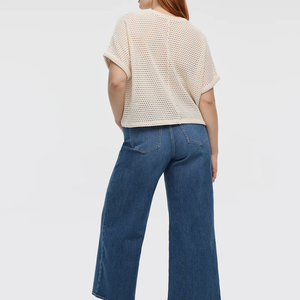 เสื้อคอกลมแขนสั้นถักสีครีมสีทึบทรงหลวมสวมใส่สบายสำหรับผู้หญิง - Product Image 2