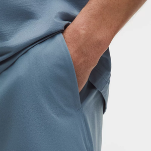 กางเกงขาสั้นกีฬาผู้ชาย OEM สกรีนโลโก้ได้ เอวยางยืด ระบายอากาศได้ดี ผ้าฝ้าย 100% แห้งเร็ว เหมาะสำหรับวิ่งในฤดูร้อน - Product Image 5