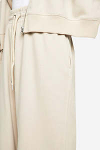 กางเกงวอร์มขายดี สีเบจล้วน ทรงขากว้าง สำหรับใส่ลำลอง เนื้อผ้าระบายอากาศดี มีเชือกผูกเอวแบบตัดกัน ทรงโอเวอร์ไซส์ เหมาะสำหรับฤดูหนาว - Product Image 3