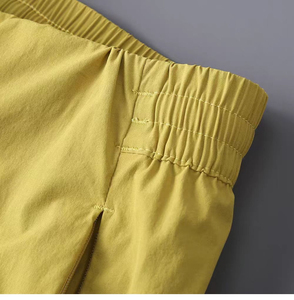 Shorts Bermuda pour homme, couleur jaune unie, séchage rapide, avec cordon de serrage, poches zippées, vêtements décontractés pour l'extérieur - Product Image 5