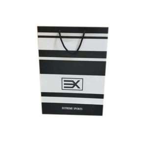 Premium <b>Biodegradable</b> <b>Paper</b> Shopping Bag Black White Striped Twisted Handle Offset Printed Art <b>Paper</b> - Product Image 1