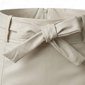 Jupe crayon mini en cuir PU taille haute pour femme avec nœud et fermetures éclair latérales, style club sexy, couleur unie - Product Image 4