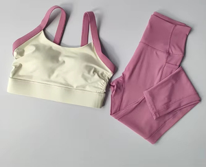 Conjunto de yoga de 2 piezas para mujer con bloques de color de alta intensidad, espalda cruzada, cintura alta y sujetador deportivo sin mangas - Product Image 1