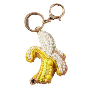 Abalorios para bolsos de taxi bordados con cuentas de semilla, hechos a mano y de diseño personalizado, con borlas tejidas de estilo de dibujos animados - Product Image 4