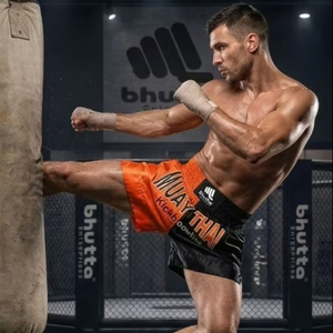 กางเกงมวยไทยพรีเมียม ผ้าซาติน สกรีนโลโก้ได้ ออกแบบเองได้ สำหรับคิกบ็อกซิ่ง MMA ฝึกซ้อม ระบายอากาศได้ดี ทรงหลวม ใส่ได้ทั้งชายและหญิง - Product Image 2