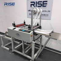 Machine industrielle de laminage et de découpe pour le traitement de films multicouches, de rubans adhésifs et de matériaux en rouleau, avec fonction de découpe en feuilles.