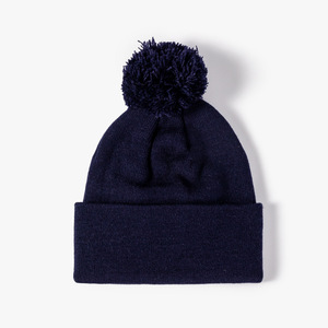 Gorros de lana con pompones al por mayor con logotipo personalizado de un proveedor de gorros para las colecciones de invierno de boutiques estadounidenses - Product Image 1