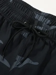 Shorts de plage pour hommes à imprimé camouflage, séchage rapide, taille à cordon de serrage, maillots de bain avec poches, tissu en polyester tissé - Product Image 4