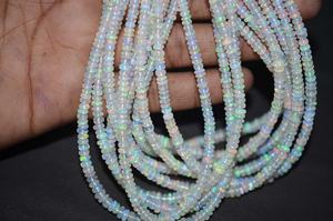 Cuentas de piedras preciosas de Rondelle lisas de ópalo etíope llamativo Natural de 3mm y 4mm calidad AAA Multi Fire Welo Opal por mayor proveedor de cuentas - Product Image 3