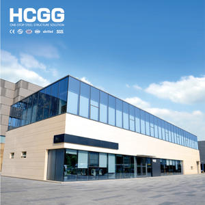 Structures en acier préfabriquées Q355B personnalisables à faible coût pour salles d'exposition automobiles 4S, bâtiments métalliques à ossature spatiale, ateliers et entrepôts - Product Image 1
