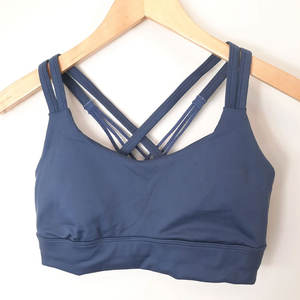 Nouveaux designs excitants de soutiens-gorge de sport pour femme, à séchage rapide, push-up, pour la course, le yoga, avec fermeture éclair avant réglable et bretelles croisées. - Product Image 1