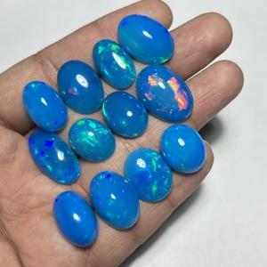 Opale naturelle super fine, taille ovale, cabochon, véritable opale d'Éthiopie Welo, couleur bleu Pryba, opale Welo en vrac pour bijoux - Product Image 1