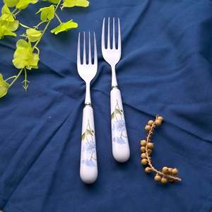 Ensemble de 2 fourchettes en acier inoxydable à manche en céramique motif marguerites – Idéal pour fruits, desserts, usage en restaurant, petite taille, compatible Halloween - Product Image 1