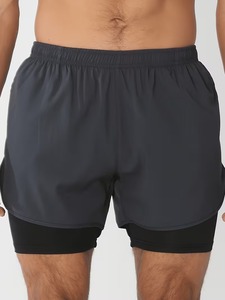 Shorts de sport pour homme, couleur unie, avec poches, séchage rapide, taille élastique, longueur mi-cuisse, en spandex et polyester, pour l'entraînement - Product Image 2