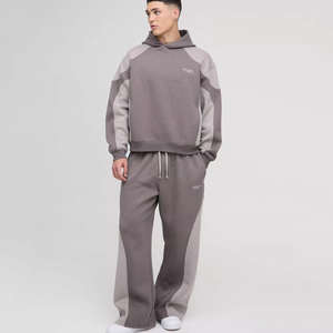 Conjunto de chándal de dos piezas para hombre, estilo urbano, de gran demanda, con capucha y detalles de costura, corte holgado y extragrande, con pantalón jogger y bolsillos - Product Image 1