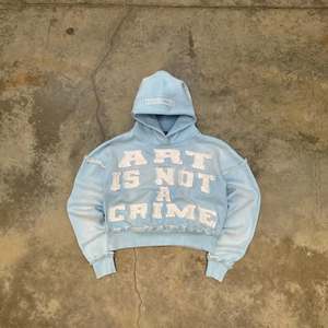 Light Blue Cropped Hoodie. Oversized <b>Bleached</b> Effect Graphic Hoodie. Distressed Raw Hem Streetwear Crop Jacket. OEM Manufacturer - Product Image 1