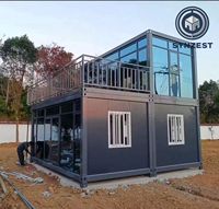 Maison conteneur préfabriquée de 20 pieds avec toit en pente, mur-rideau en verre, conteneur démontable en kit pour habitation, boutique ou bureau