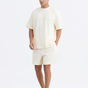 Ensemble décontracté ample pour homme, tenue d'été en deux pièces avec chemise texturée et short assorti, ensemble de vêtements de plage pour homme - Product Image 1