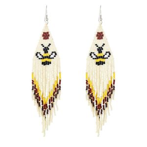 Pendientes de cuentas de arroz pequeñas de estilo étnico europeo y americano, con borlas largas de animales tejidas a mano. - Product Image 5