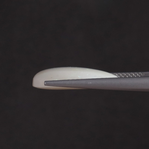 โอปอลสีขาวธรรมชาติ พลอยหลวม 5.17 กะรัต รูปทรงวงรี 18x11 มม. รับรองโดย IGI ขัดเงาด้วยมือ ลงแว็กซ์/น้ำมัน ขายส่งเครื่องประดับ - Product Image 2