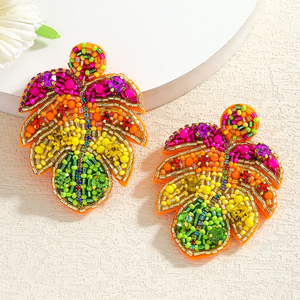 ต่างหูทำมือสไตล์โบฮีเมียนสีสันสดใสประดับลูกปัดรูปใบไม้เขตร้อนและเม็ดข้าวหลากสี โดย MD HANDICRAFTS - Product Image 1