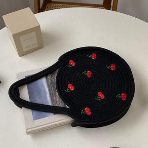 Bring playful charm to your everyday look with this stunning Natural yarn <b>bag</b> featuring <b>sweet</b> cherry embroidery and round handle - Product Image 2