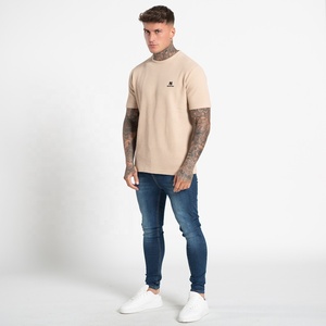 T-shirt à manches courtes pour hommes de couleur beige dans le tissu de coton côtelé T-shirt de polo personnalisé en coton Slim Fit pour homme pour l'impression - Product Image 1
