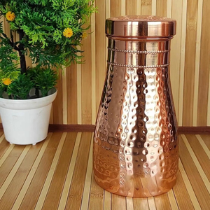 Restaurant grade copper water bottle premium serving <b>drinkware</b> for hotels cafes dining table presentation and service - Product Image 1