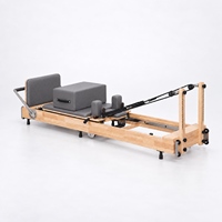 Reformer de Pilates pliable, structure en chêne massif et revêtement en cuir PU, appareil d'exercice pour salles de Pilates partagées