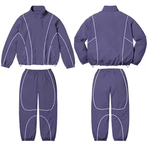 Conjunto Deportivo Personalizado OEM Azul de Dos Tonos: Chaqueta Anorak con Cierre de Cremallera y Pantalones con Bolsillos Tipo Cargo, Marca Privada, MOQ Bajo - Product Image 1