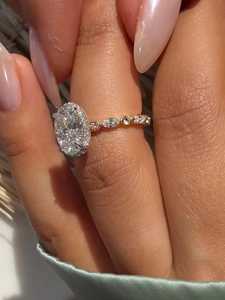 แหวนหมั้นเพชรทรงรี 3 กะรัต เพชรเลี้ยงในห้องปฏิบัติการ ตัวเรือนทองคำแท้ 14K สองสี ประดับด้วยวงแหวนแบบซ่อน ราคาโรงงาน - Product Image 5