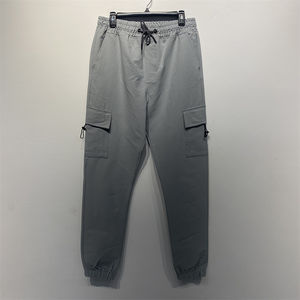 Safari en el desierto: Tonos arena que absorben la humedad con bolsillos plisados optimizados para aventuras en climas cálidos. - Product Image 1