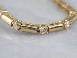 Pulsera de tenis para mujer Tishya de plata de ley con diamantes y moissanita de corte redondo de 4 quilates, chapada en oro amarillo de 14 quilates - Product Image 1