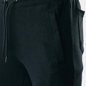 Pantalon de jogging fuselé noir en coton pour homme avec cordon de serrage à la taille et poches latérales - Product Image 3